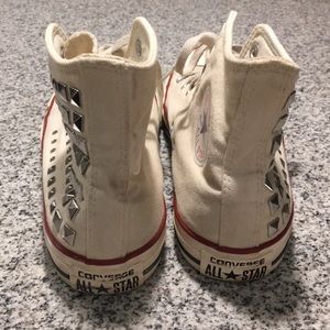 Tan studded converse